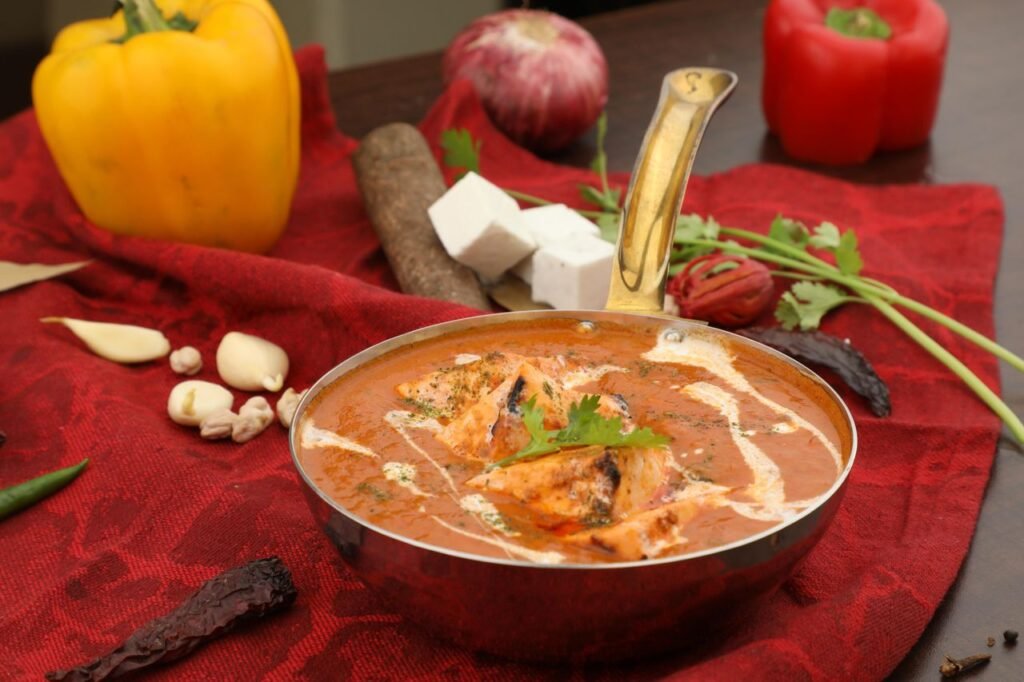 Flavorful paneer tikka masala with fresh ingredients, captured in Bengaluru, India.